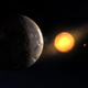 Representación artística de Kepler-1649c junto a su estrella y un segundo planeta descubierto con anterioridad al fondo.